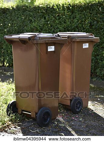 Brown garbage bins for organic waste with barcode labels, Stuttgart, Baden-Württemberg, Germany, Europe View Large Photo Image Picture - Brown garbage bins for organic waste with barcode labels, Stuttgart, Baden-Württemberg, Germany, Europe. Fotosearch