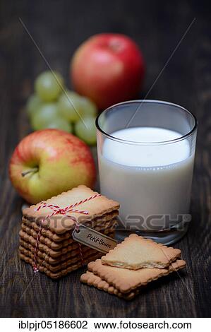 Butter biscuits and glass of milk View Large Photo Image Stock Image - Butter biscuits and glass of milk. Fotosearch