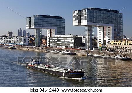 Cargo ship, crane houses, Rheinauhafen, Cologne, Rhineland, North Rhine-Westphalia, Germany, Europe View Large Photo Image Stock Image - Cargo ship, crane houses, Rheinauhafen, Cologne, Rhineland, North Rhine-Westphalia, Germany, Europe. Fotosearch
