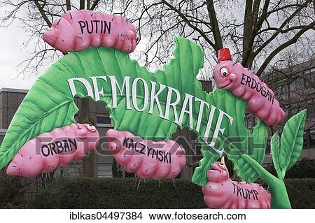 Caterpillars eat green leaf, enemies of democracy, Putin, Erdogan, Trump, Orban, Kaczinsky, political caricature, paper mache, Motto Cart Carnival Monday procession 2017, Düsseldorf, Rhineland, North Rhine-Westphalia, Germany, Europe View Large Photo Image Picture - Caterpillars eat green leaf, enemies of democracy, Putin, Erdogan, Trump, Orban, Kaczinsky, political caricature, paper mache, Motto Cart Carnival Monday procession 2017, Düsseldorf, Rhineland, North Rhine-Westphalia, Germany, Europe. Fotosearch