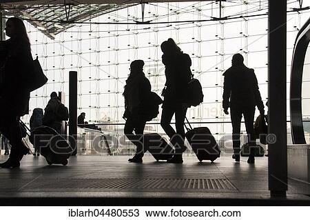 Central Station, travelers with luggage, silhouette, Berlin, Germany, Europe View Large Photo Image Stock Image - Central Station, travelers with luggage, silhouette, Berlin, Germany, Europe. Fotosearch