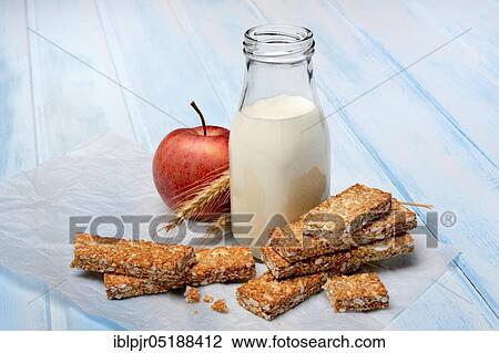 Cereal bar, apple and bottle with milk, power bar View Large Photo Image Stock Image - Cereal bar, apple and bottle with milk, power bar. Fotosearch