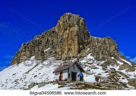 Chapel of Dreizinnenhütte in front of Sextener Stein in snow, Sexten Dolomites, South Tyrol Province, Province of South Tyrol, Italy, Europe View Large Photo Image Stock Photograph - Chapel of Dreizinnenhütte in front of Sextener Stein in snow, Sexten Dolomites, South Tyrol Province, Province of South Tyrol, Italy, Europe. Fotosearch