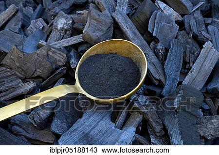 Charcoal and powdered charcoal in trowel, wood, coal, charcoal, powdered charcoal View Large Photo Image Stock Image - Charcoal and powdered charcoal in trowel, wood, coal, charcoal, powdered charcoal. Fotosearch