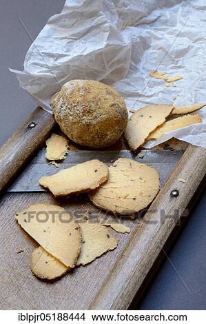 Picture - Cheese Belper tuber, Swiss truffle, Swiss truffle, sliced, Switzerland, Europe. Fotosearch