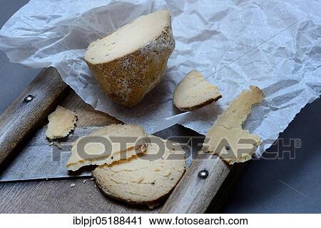Stock Image - Cheese Belper tuber, Swiss truffle, Swiss truffle, sliced, Switzerland, Europe. Fotosearch