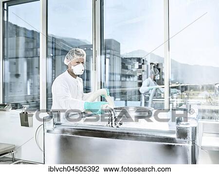 Chemical Laboratory, Chemist with hairnet and face mask in a pharmaceutical production, Austria, Europe View Large Photo Image Stock Image - Chemical Laboratory, Chemist with hairnet and face mask in a pharmaceutical production, Austria, Europe. Fotosearch