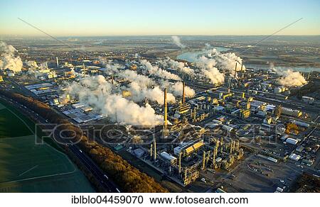 Chempark Dormagen with steaming chimneys in the morning light, production, research and services companies, chemical industry, Cologne, Rhineland, North Rhine-Westphalia, Germany, Europe View Large Photo Image Stock Image - Chempark Dormagen with steaming chimneys in the morning light, production, research and services companies, chemical industry, Cologne, Rhineland, North Rhine-Westphalia, Germany, Europe. Fotosearch