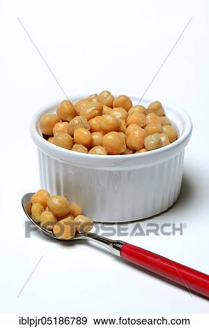 Chickpeas ( Cicer arietinum) in bowl and spoon View Large Photo Image Stock Photo - Chickpeas ( Cicer arietinum) in bowl and spoon. Fotosearch