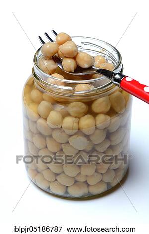 Chickpeas ( Cicer arietinum) in glass with fork View Large Photo Image Stock Photo - Chickpeas ( Cicer arietinum) in glass with fork. Fotosearch