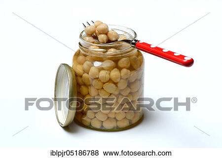 Chickpeas ( Cicer arietinum) in glass with fork View Large Photo Image Stock Photo - Chickpeas ( Cicer arietinum) in glass with fork. Fotosearch