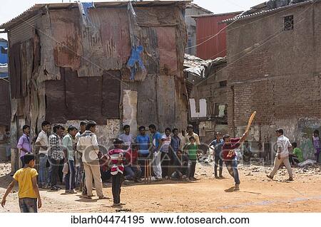 Children and teenagers playing cricket, national sport, Dharavi Slum, Mumbai, Maharashtra, India, Asia View Large Photo Image Stock Photography - Children and teenagers playing cricket, national sport, Dharavi Slum, Mumbai, Maharashtra, India, Asia. Fotosearch