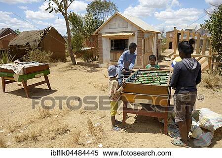 Stock Photography - Children playing table football, Avarabohitra Fenomanano village, Tsiroanomandidy district, Bongolava region, Madagascar, Africa. Fotosearch