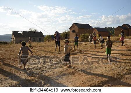 Children playing, village Tsaramadoandro, district Tsiroanomandidy region Bongolava, Madagascar, Africa View Large Photo Image Stock Photo - Children playing, village Tsaramadoandro, district Tsiroanomandidy region Bongolava, Madagascar, Africa. Fotosearch