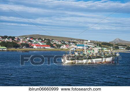 Stock Photo - Chinese squid trawler in Stanley capital of the Falklands, South America. Fotosearch