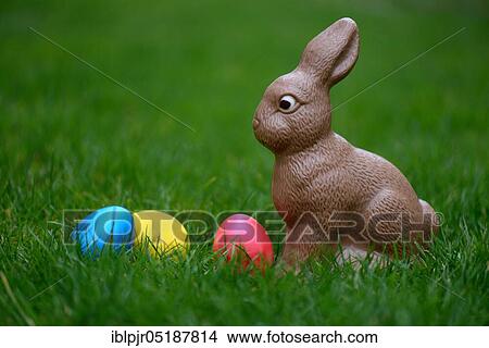 Picture - Chocolate Easter bunny and Easter eggs, chocolate bunny. Fotosearch