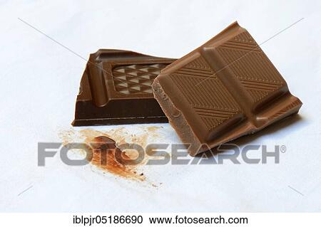 Chocolate stain on fabric, chocolate stain, chocolate pieces View Large Photo Image Stock Image - Chocolate stain on fabric, chocolate stain, chocolate pieces. Fotosearch