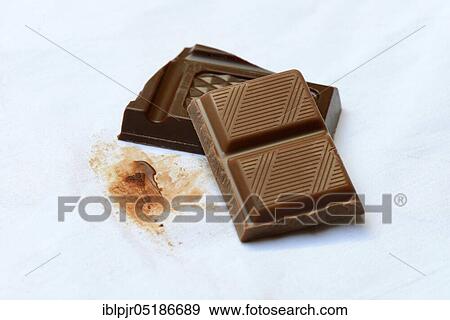 Chocolate stain on fabric, chocolate stain, chocolate pieces View Large Photo Image Stock Photo - Chocolate stain on fabric, chocolate stain, chocolate pieces. Fotosearch