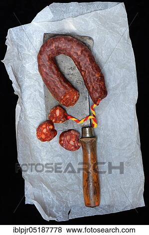 Stock Photo - Chorizo, chorizo sausage and cleaver, paprika sausage. Fotosearch