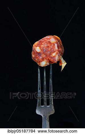 Chorizo, chorizo sausage on fork, paprika sausage View Large Photo Image Picture - Chorizo, chorizo sausage on fork, paprika sausage. Fotosearch