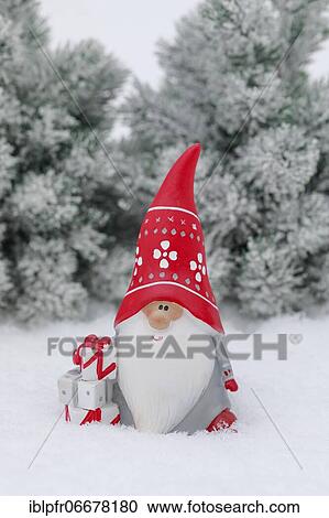 Stock Image - Christmas decoration in the snow with Santa Claus. Fotosearch