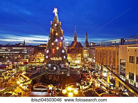 Christmas tree and Christmas Market on Hansaplatz, Dortmund, North Rhine-Westphalia, Germany, Europe View Large Photo Image Stock Photograph - Christmas tree and Christmas Market on Hansaplatz, Dortmund, North Rhine-Westphalia, Germany, Europe. Fotosearch