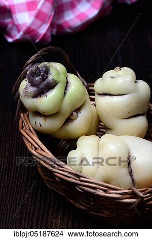 Picture - Cinnamon potatoes, tuberous nasturtium, Tropaeolum tuberosum. Fotosearch