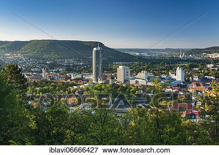 Stock Photo - City view with JenTower and Friedrich-Schiller-University, Jena, Saale valley, Thuringia, Germany, Europe. Fotosearch