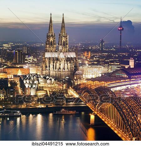 Cityscape with Cologne Cathedral, Hohenzollern Bridge and the Rhine at dusk, Cologne, Rhineland, North Rhine-Westphalia, Germany, Europe View Large Photo Image Stock Photography - Cityscape with Cologne Cathedral, Hohenzollern Bridge and the Rhine at dusk, Cologne, Rhineland, North Rhine-Westphalia, Germany, Europe. Fotosearch