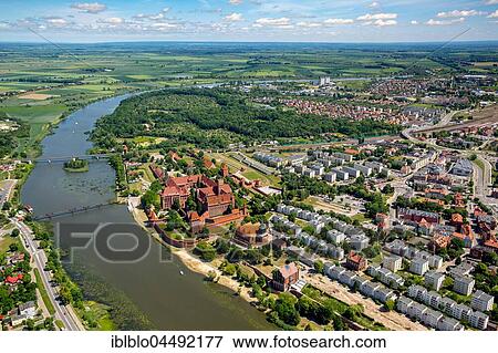 Stock Photo - Cityscape with Ordensburg, Nogat River, Malbork, Pomerania Province, Poland, Europe. Fotosearch