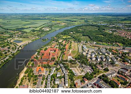 Cityscape with Ordensburg, Nogat River, Malbork, Pomerania Province, Poland, Europe View Large Photo Image Stock Photo - Cityscape with Ordensburg, Nogat River, Malbork, Pomerania Province, Poland, Europe. Fotosearch