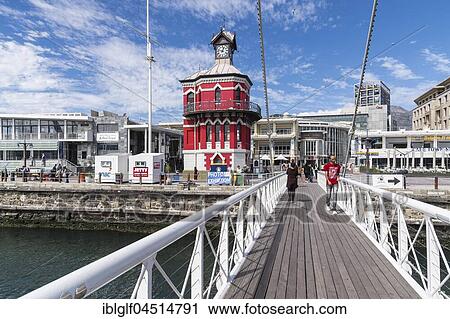 Stock Image - Clock Tower and Wrestling Bridge, Victoria and Alfred Waterfront, Cape Town, Western Cape, South Africa, Africa. Fotosearch