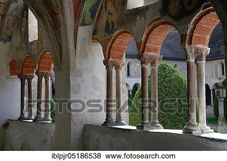 Stock Photo - Cloister in the cathedral with wall paintings, Brixen, South Tyrol. Fotosearch