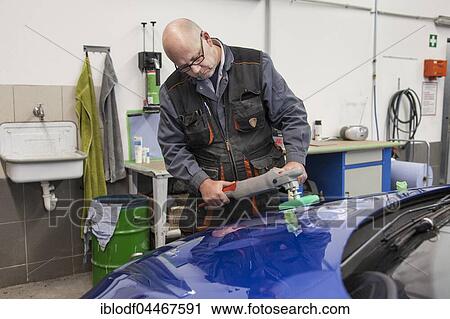 Coachbuilder master with the polishing machine on the car, Düsseldorf, North Rhine-Westphalia, Germany, Europe View Large Photo Image Stock Image - Coachbuilder master with the polishing machine on the car, Düsseldorf, North Rhine-Westphalia, Germany, Europe. Fotosearch