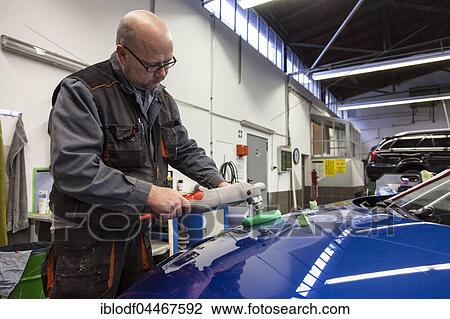 Coachbuilder master with the polishing machine on the car, Düsseldorf, North Rhine-Westphalia, Germany, Europe View Large Photo Image Stock Image - Coachbuilder master with the polishing machine on the car, Düsseldorf, North Rhine-Westphalia, Germany, Europe. Fotosearch