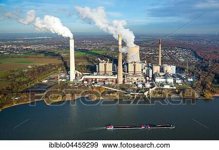 Coal power station Voerede, Steag Energy Services GmbH, cargo ship on the Rhine, Voerde, Ruhr district, North Rhine-Westphalia, Germany, Europe View Large Photo Image Stock Photo - Coal power station Voerede, Steag Energy Services GmbH, cargo ship on the Rhine, Voerde, Ruhr district, North Rhine-Westphalia, Germany, Europe. Fotosearch