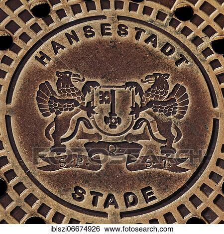 Stock Photograph - Coat of arms of the Hanseatic City of Stade on a manhole cover, Stade, Lower Saxony, Germany, Europe. Fotosearch