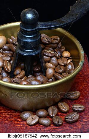 Coffee beans in a coffee mill View Large Photo Image Stock Image - Coffee beans in a coffee mill. Fotosearch