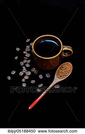 Coffee in coffee cup, coffee beans and spoon with instant coffee, Coffea arabica View Large Photo Image Stock Image - Coffee in coffee cup, coffee beans and spoon with instant coffee, Coffea arabica. Fotosearch