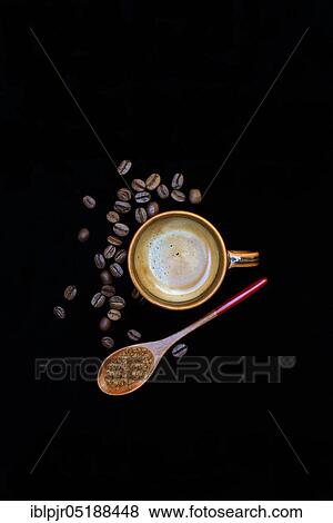 Coffee in coffee cup, coffee beans and spoon with instant coffee, Coffea arabica View Large Photo Image Stock Photo - Coffee in coffee cup, coffee beans and spoon with instant coffee, Coffea arabica. Fotosearch