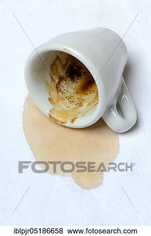 Coffee stain on tablecloth and fallen cup, spilled View Large Photo Image Stock Photo - Coffee stain on tablecloth and fallen cup, spilled. Fotosearch