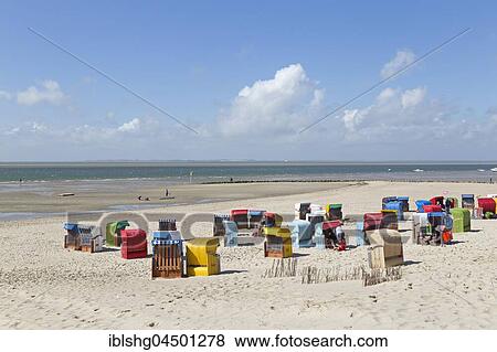 Colorful beach chairs on the beach, Utersum, Foehr Island, North Frisia, Schleswig-Holstein, Germany, Europe View Large Photo Image Stock Photo - Colorful beach chairs on the beach, Utersum, Foehr Island, North Frisia, Schleswig-Holstein, Germany, Europe. Fotosearch
