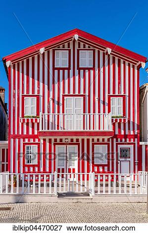 Stock Photo - Colorful house in Costa Nova, Aveiro, Portugal, Europe. Fotosearch