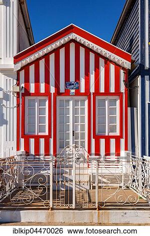 Stock Photograph - Colorful house in Costa Nova, Aveiro, Portugal, Europe. Fotosearch