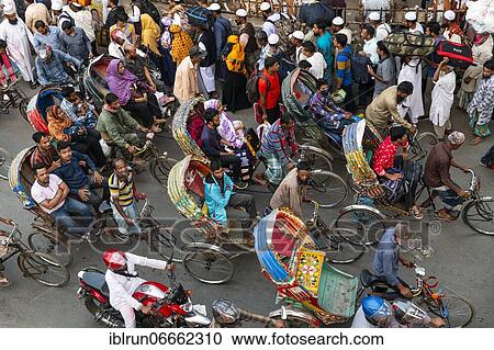 Completely with rickshaws overcrowded street in the center of Dhaka, Bangladesh, Asia View Large Photo Image Stock Image - Completely with rickshaws overcrowded street in the center of Dhaka, Bangladesh, Asia. Fotosearch