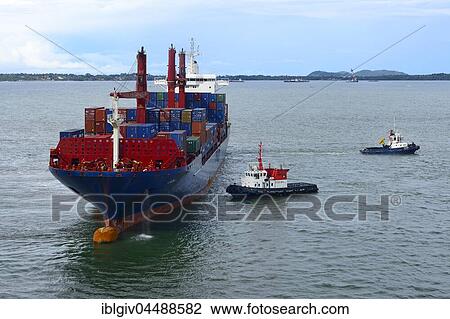 Container ship and pilot vessels berthing in the harbor, Conakry, Guinea, Africa View Large Photo Image Stock Image - Container ship and pilot vessels berthing in the harbor, Conakry, Guinea, Africa. Fotosearch