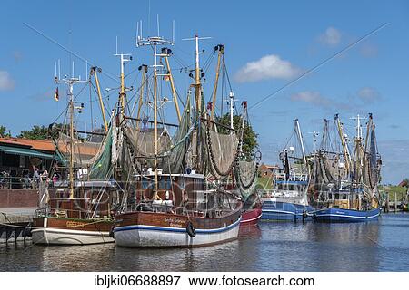 Crab cutter in the fishing harbour, Greetsiel, Lower Saxony, Germany, Europe View Large Photo Image Stock Photo - Crab cutter in the fishing harbour, Greetsiel, Lower Saxony, Germany, Europe. Fotosearch