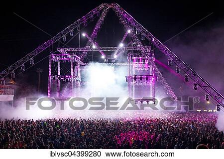 Crowd at Laser Show, Festival Techno Rave Nature One 2016, Red Dancing Flames, Hunsrück, Kastellaun, Rhineland-Palatinate, Germany, Europe View Large Photo Image Stock Image - Crowd at Laser Show, Festival Techno Rave Nature One 2016, Red Dancing Flames, Hunsrück, Kastellaun, Rhineland-Palatinate, Germany, Europe. Fotosearch