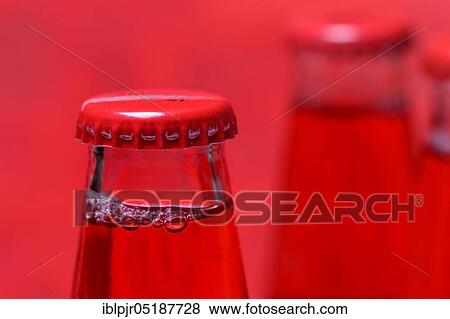 Stock Photo - Crown cap on bottle, Campari. Fotosearch