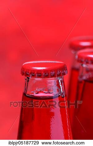 Crown cap on bottle, Campari View Large Photo Image Stock Photo - Crown cap on bottle, Campari. Fotosearch